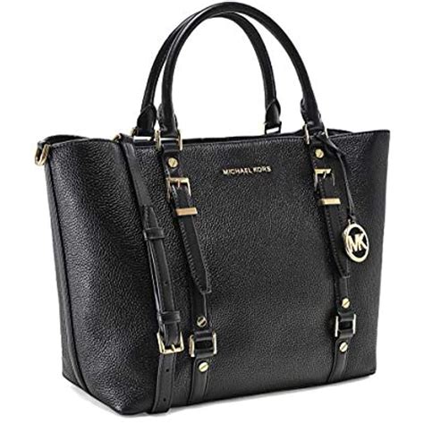 michael kors white black purse|Michael Kors black leather handbag.